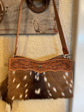 Tooled axis button purse
